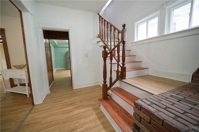 11 White St, Kirkland, NY 13323 - stairway featuring wood finished floors and baseboards