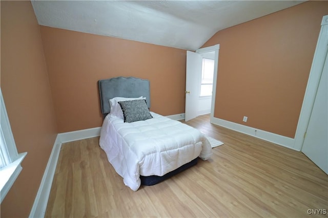 11 White St, Kirkland, NY 13323 - bedroom with lofted ceiling, light wood-type flooring, and baseboards