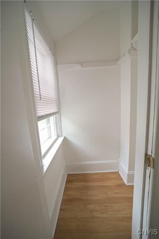 11 White St, Kirkland, NY 13323 - unfurnished room featuring light wood-type flooring, baseboards, and lofted ceiling