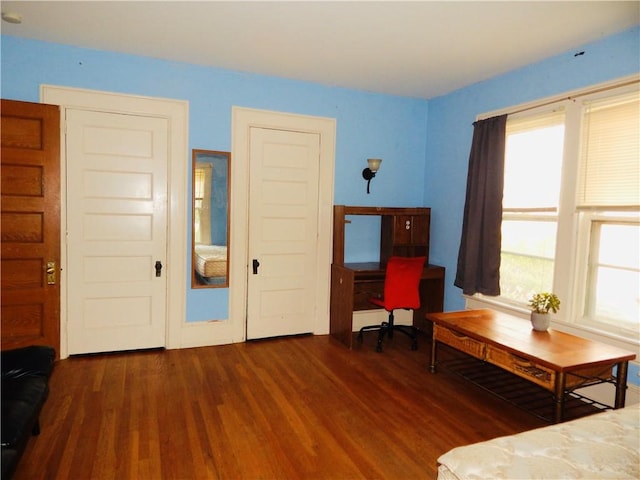 7 Walnut St, Oneonta-City, NY 13820 - bedroom with wood finished floors and an office area