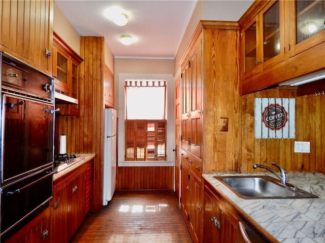7 Walnut St, Oneonta-City, NY 13820 - kitchen with a warming drawer, a sink, freestanding refrigerator, oven, and dark wood-style flooring