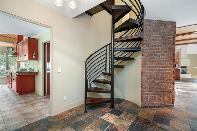 4331 Tichenor Point Dr, Canandaigua-Town, NY 14424 - stairway featuring stone tile floors and baseboards