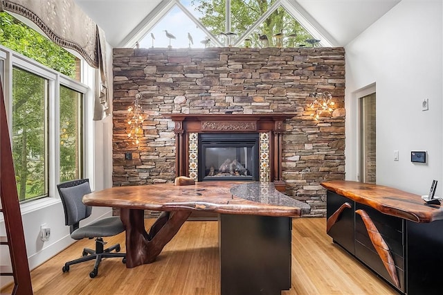 4331 Tichenor Point Dr, Canandaigua-Town, NY 14424 - office space with high vaulted ceiling, wood finished floors, plenty of natural light, a fireplace, and baseboards