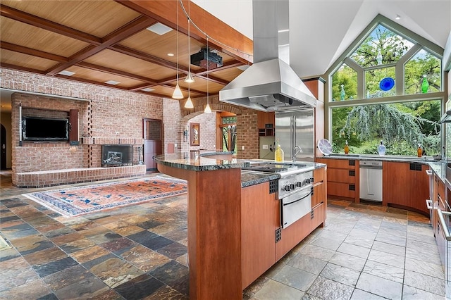 4331 Tichenor Point Dr, Canandaigua-Town, NY 14424 - kitchen with brick wall, island range hood, open floor plan, built in refrigerator, and stone tile flooring