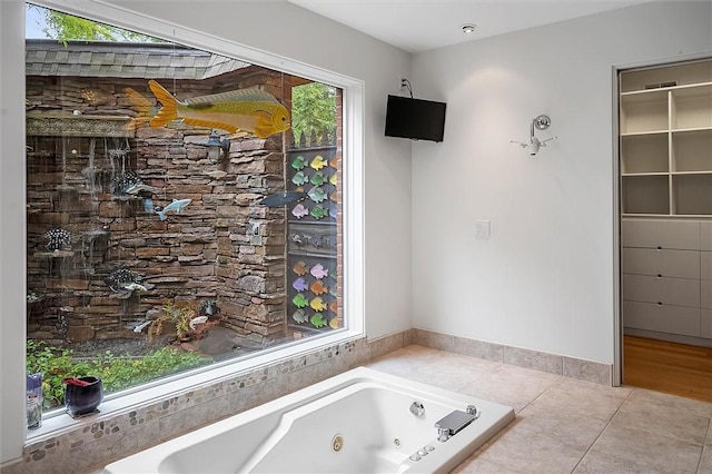4331 Tichenor Point Dr, Canandaigua-Town, NY 14424 - bathroom featuring a jetted tub and tile patterned flooring