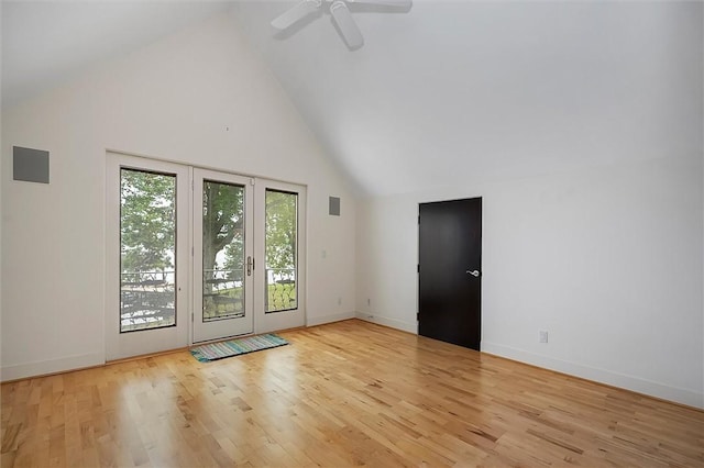 4331 Tichenor Point Dr, Canandaigua-Town, NY 14424 - unfurnished room with high vaulted ceiling, a ceiling fan, light wood-style flooring, and baseboards