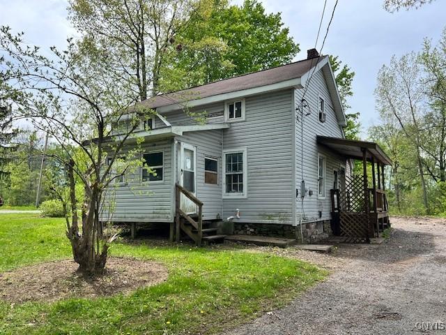 6385 State Route 26, Westmoreland, NY 13440 - view of front of house with entry steps and a chimney