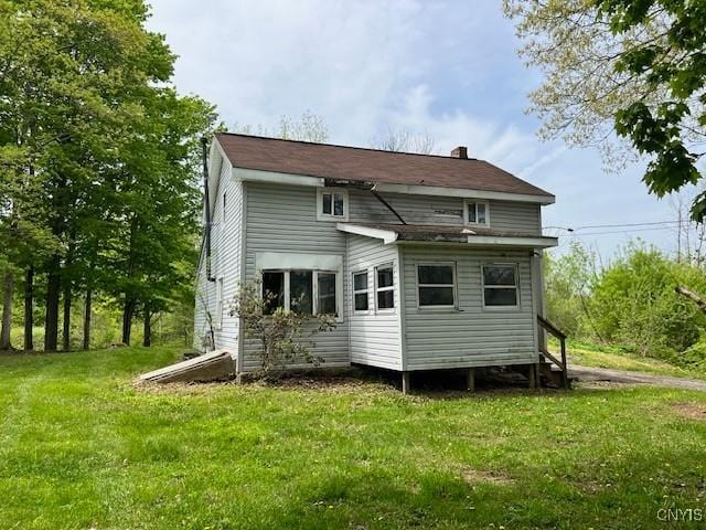 6385 State Route 26, Westmoreland, NY 13440 - rear view of property with a lawn