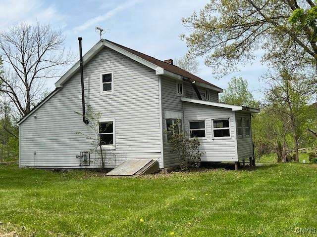 6385 State Route 26, Westmoreland, NY 13440 - rear view of house with a lawn