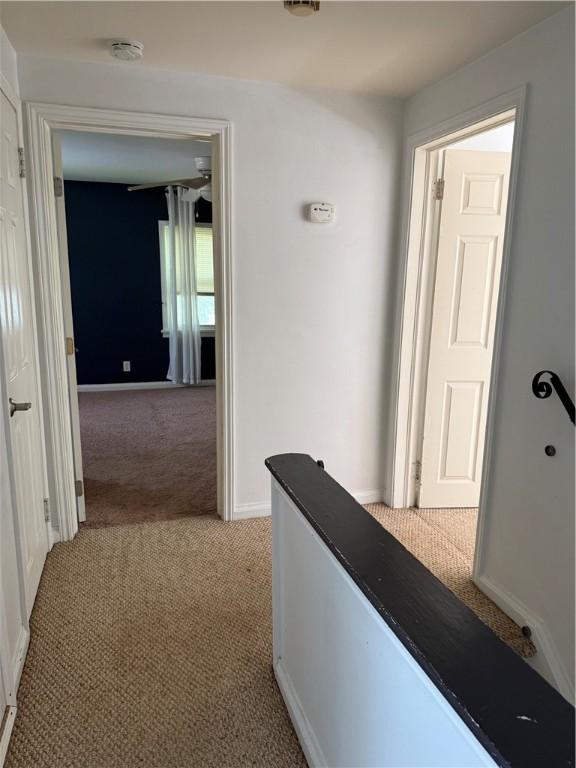167 Rogers Pkwy, Irondequoit, NY 14617 - hallway with light carpet and baseboards