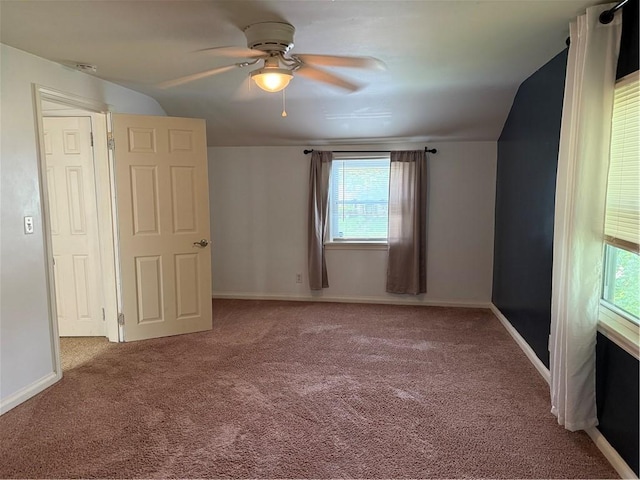 167 Rogers Pkwy, Irondequoit, NY 14617 - carpeted empty room featuring lofted ceiling, ceiling fan, and baseboards