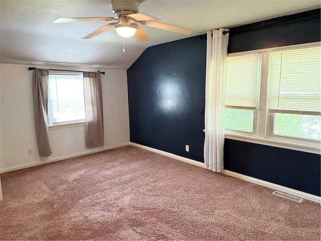 167 Rogers Pkwy, Irondequoit, NY 14617 - empty room with carpet floors, a ceiling fan, lofted ceiling, and baseboards