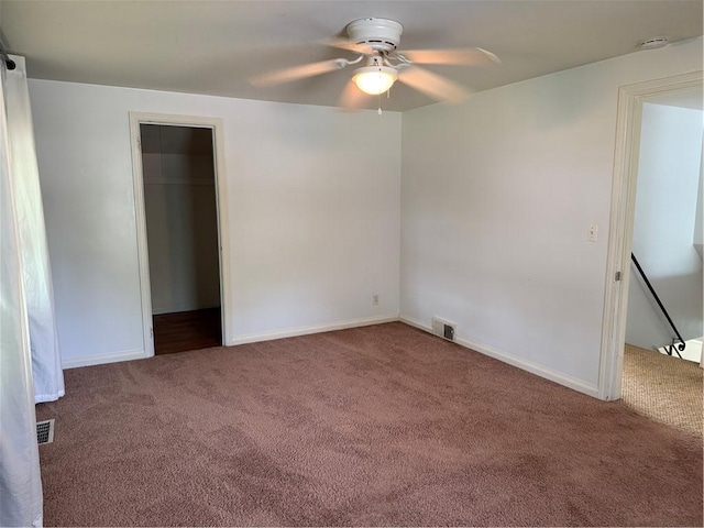 167 Rogers Pkwy, Irondequoit, NY 14617 - unfurnished bedroom featuring carpet, ceiling fan, baseboards, and a closet
