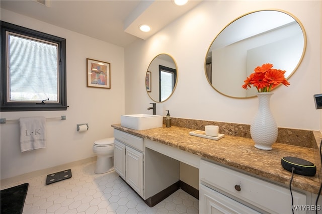 14 Wynngate Ln, Amherst, NY 14221 - bathroom with vanity, recessed lighting, and tile patterned floors
