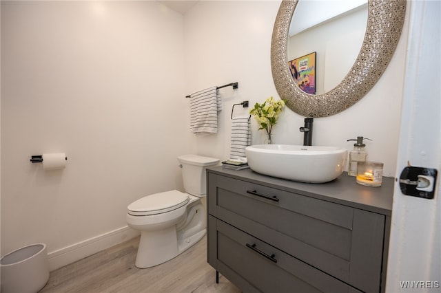 14 Wynngate Ln, Amherst, NY 14221 - half bathroom featuring wood finished floors and vanity