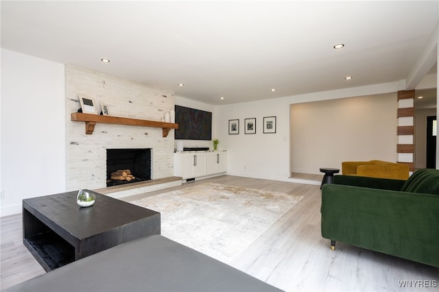 14 Wynngate Ln, Amherst, NY 14221 - living room featuring wood finished floors, a fireplace, and recessed lighting