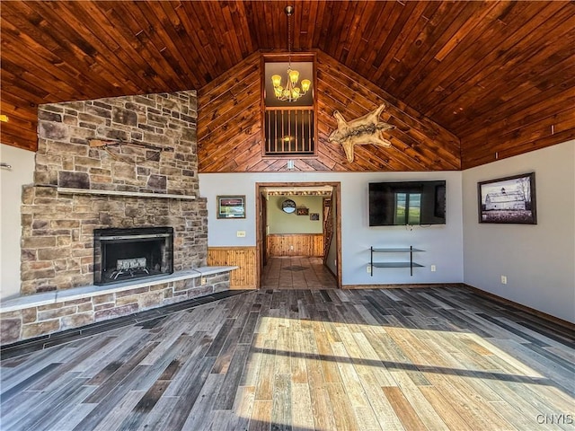 657 W Cottage Ln, Deruyter, NY 13052 - unfurnished living room featuring a chandelier, wooden ceiling, hardwood / wood-style flooring, high vaulted ceiling, and a stone fireplace