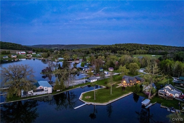 657 W Cottage Ln, Deruyter, NY 13052 - aerial view of property's location featuring a heavily wooded area and a nearby body of water