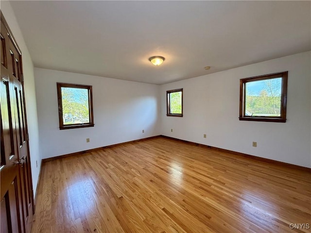 657 W Cottage Ln, Deruyter, NY 13052 - spare room with light wood-style floors and baseboards