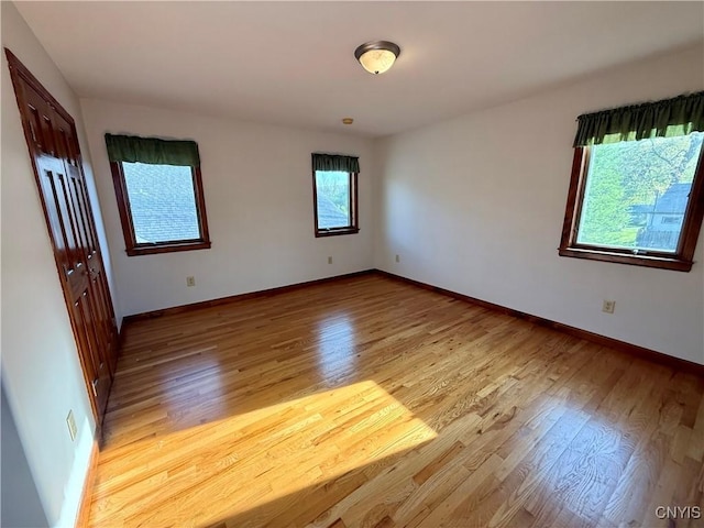 657 W Cottage Ln, Deruyter, NY 13052 - spare room with light wood-style floors and baseboards