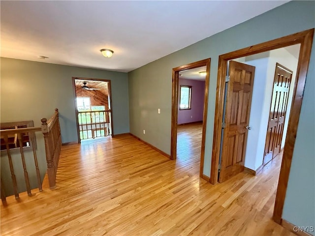 657 W Cottage Ln, Deruyter, NY 13052 - unfurnished room featuring light wood finished floors, baseboards, and ceiling fan