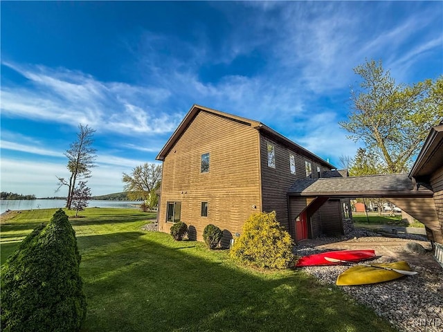 657 W Cottage Ln, Deruyter, NY 13052 - view of property exterior with a lawn and a water view