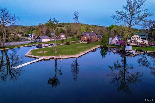 657 W Cottage Ln, Deruyter, NY 13052 - drone / aerial view of a large body of water and a heavily wooded area