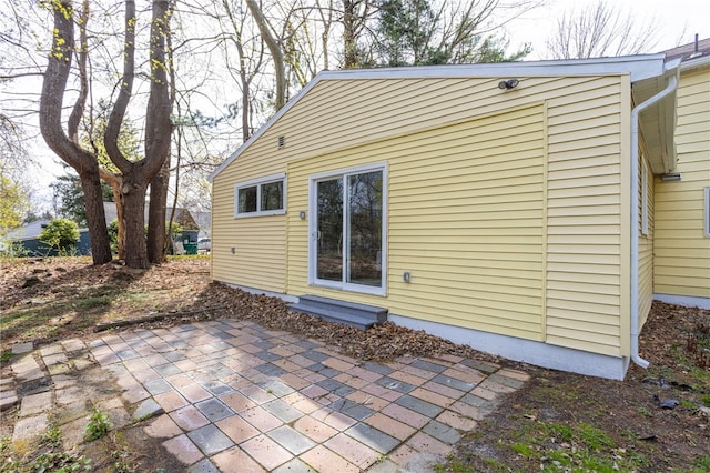 848 Weiland Rd, Greece, NY 14626 - rear view of house featuring a patio area