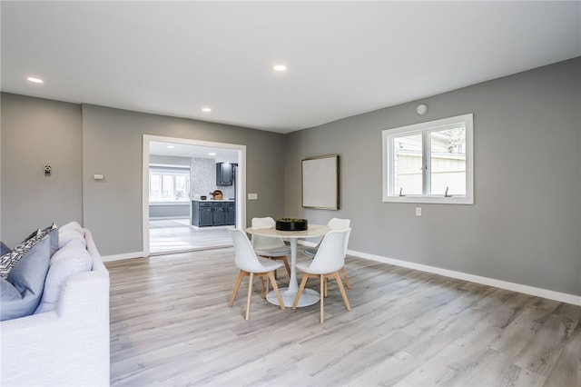 848 Weiland Rd, Greece, NY 14626 - dining area featuring light wood finished floors, baseboards, and recessed lighting