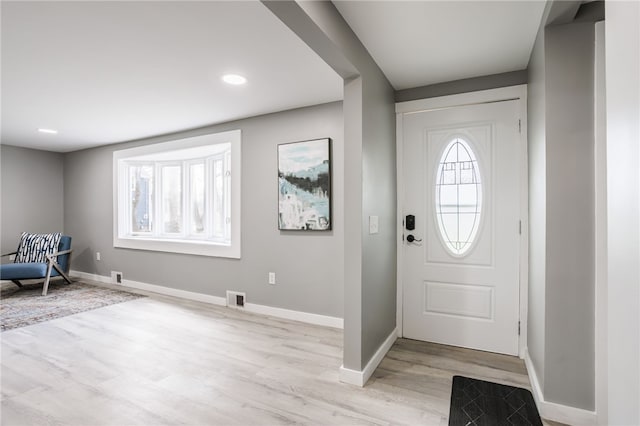 848 Weiland Rd, Greece, NY 14626 - entryway with light wood-style flooring, baseboards, and recessed lighting
