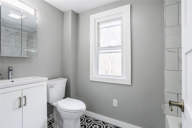848 Weiland Rd, Greece, NY 14626 - full bath featuring toilet, vanity, baseboards, and a tub