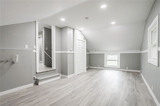 848 Weiland Rd, Greece, NY 14626 - bonus room featuring lofted ceiling, light wood finished floors, and baseboards
