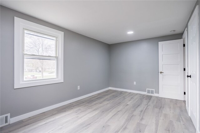 848 Weiland Rd, Greece, NY 14626 - empty room with light wood finished floors, baseboards, and recessed lighting