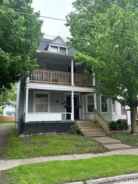332 Winslow St, Watertown-City, NY 13601 - view of front of house featuring a balcony and a porch