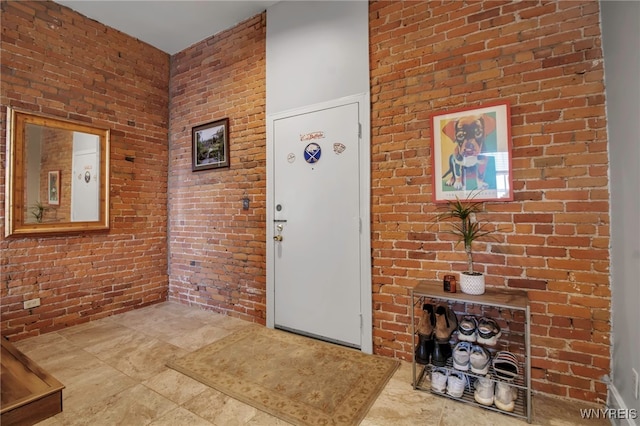 125 Edward St Unit 2G, Buffalo, NY 14201 - foyer entrance featuring brick wall