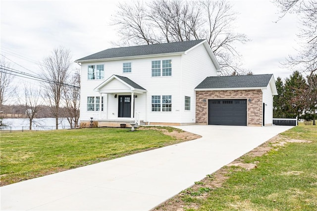 1965 Main St, Carlton, NY 14571 - colonial-style house with a garage, driveway, and a front yard