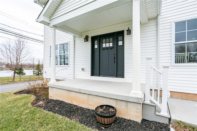 1965 Main St, Carlton, NY 14571 - view of exterior entry featuring covered porch