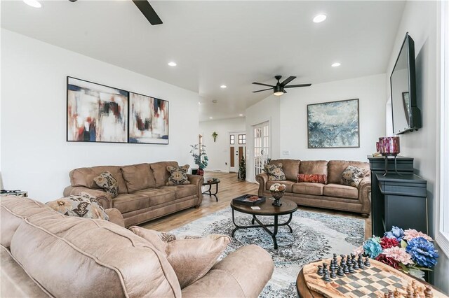 1965 Main St, Carlton, NY 14571 - living room featuring ceiling fan, recessed lighting, and wood finished floors
