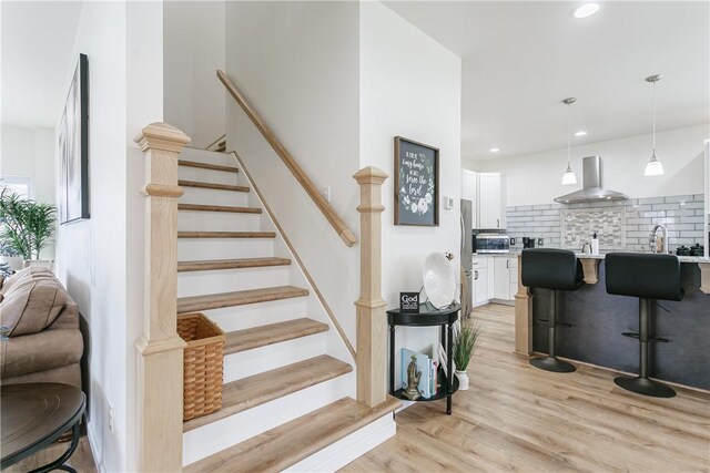 1965 Main St, Carlton, NY 14571 - stairs with wood finished floors and recessed lighting