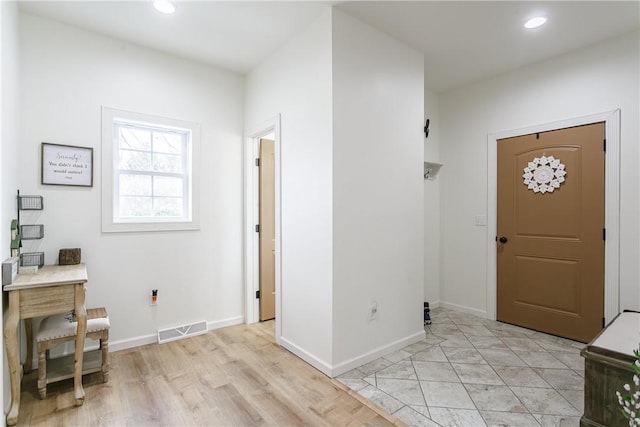 1965 Main St, Carlton, NY 14571 - foyer entrance featuring recessed lighting, baseboards, and light wood-style floors