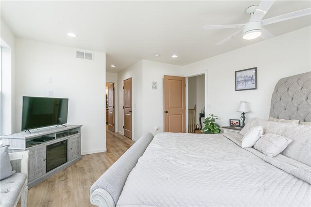 1965 Main St, Carlton, NY 14571 - bedroom with light wood finished floors, recessed lighting, a ceiling fan, baseboards, and ensuite bathroom