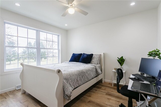 1965 Main St, Carlton, NY 14571 - bedroom with wood finished floors, baseboards, recessed lighting, a desk, and a ceiling fan