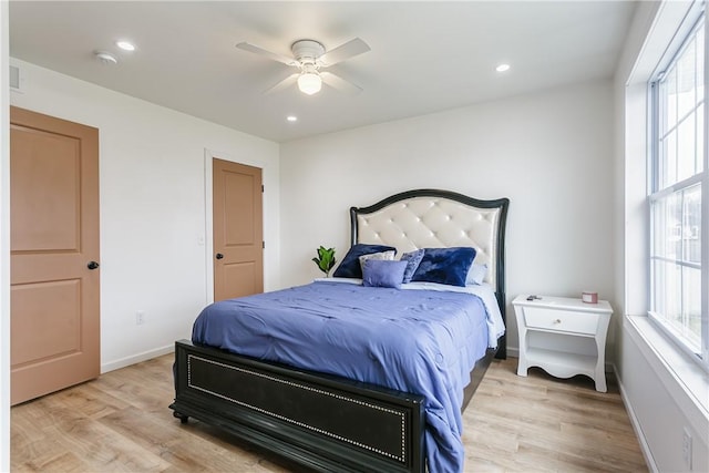 1965 Main St, Carlton, NY 14571 - bedroom featuring multiple windows, light wood-style floors, recessed lighting, ceiling fan, and baseboards