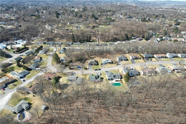 aerial overview of property's location with nearby suburban area