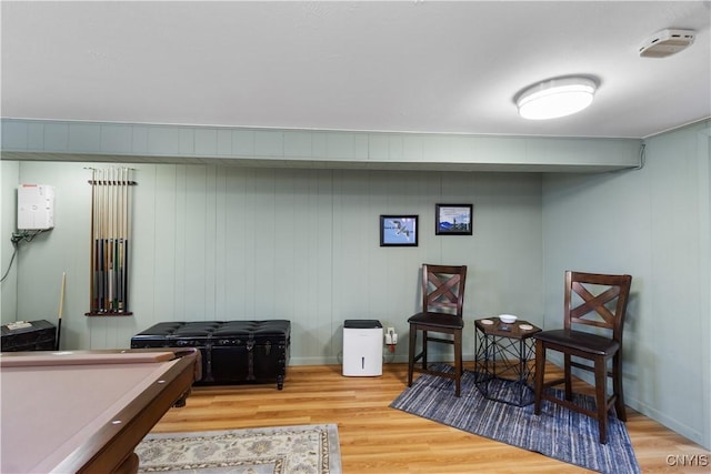 game room with pool table and wood finished floors