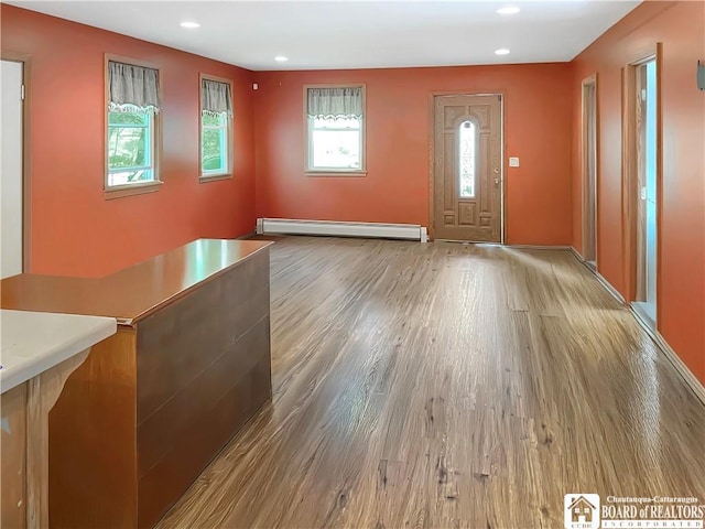 230 Dale Dr, Stockton, NY 14718 - entryway featuring baseboard heating, wood finished floors, baseboards, and recessed lighting