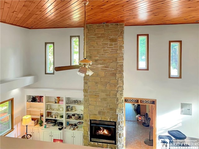 230 Dale Dr, Stockton, NY 14718 - living room with a ceiling fan, a fireplace, and wood ceiling