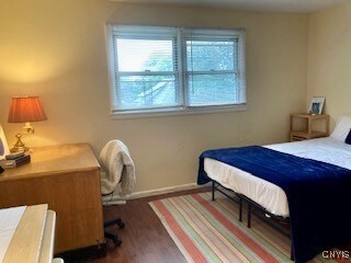 1018-20 Ackerman Ave Unit 1020, Syracuse, NY 13210 - bedroom with wood finished floors and baseboards