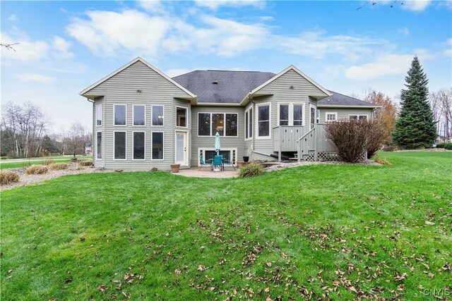 8312 Partridgeberry Dr, Lysander, NY 13027 - rear view of property featuring a patio, a yard, and roof with shingles