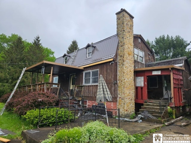 5162 Whig St, Little Valley, NY 14779 - back of property with metal roof, a chimney, and board and batten siding